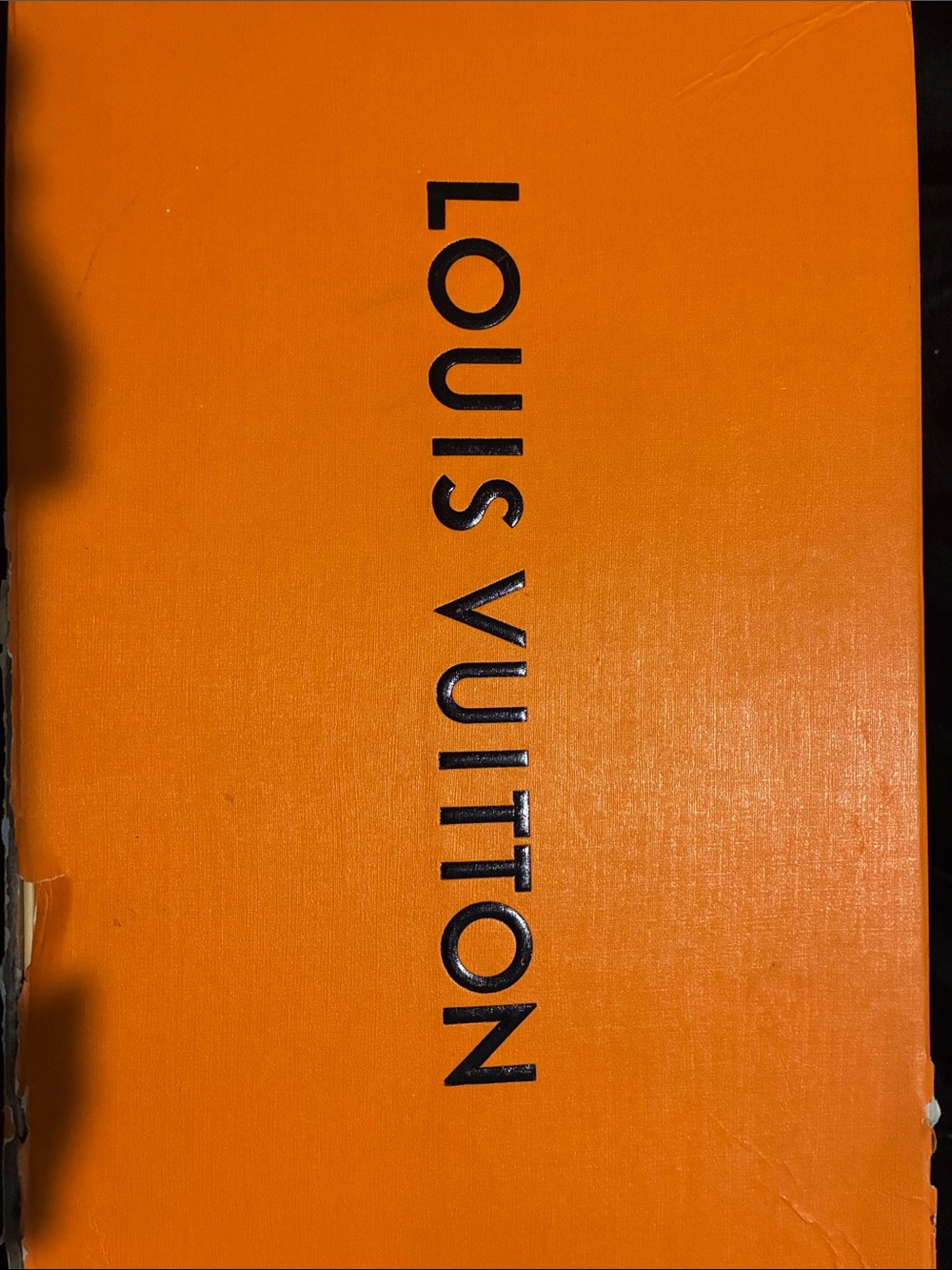 Louis Vuitton Black Logo on Vibrant Orange Box
